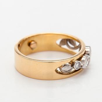 Sormus, briljantti- ja markiisihiontaiset timantit, 18K kultaa. Kultasarvi, Åbo 2003.