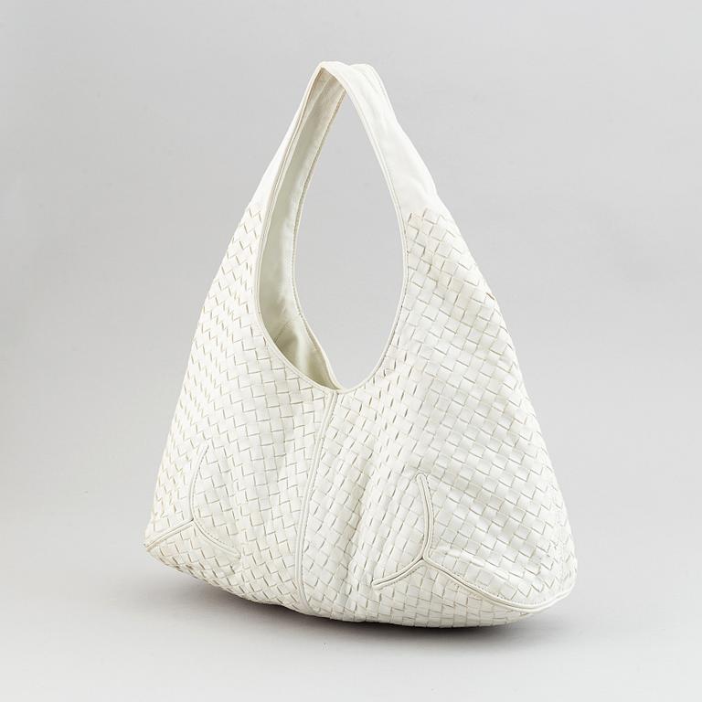 Bottega Veneta, a white intrecciato leather hobo bag.