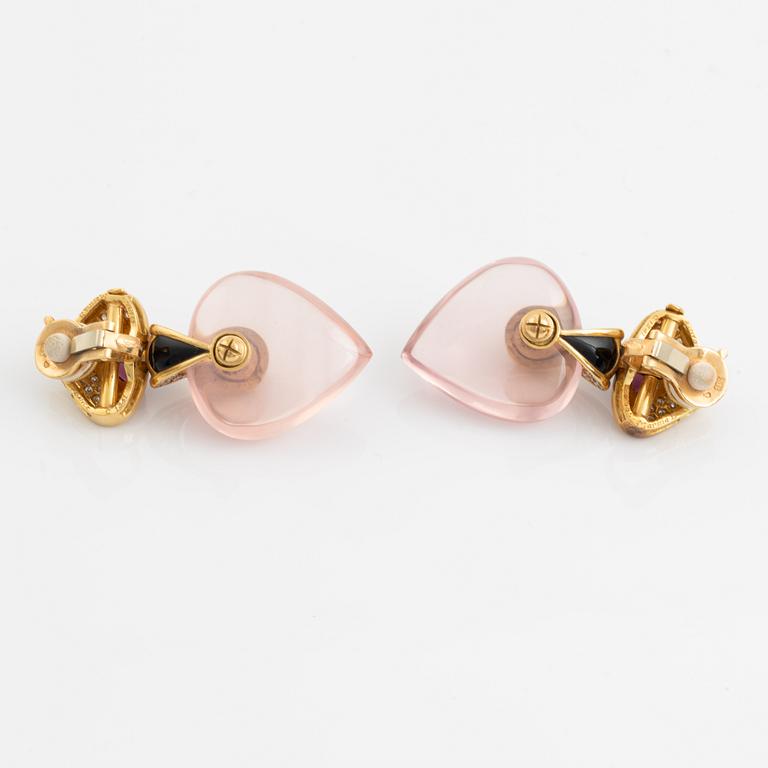 A pair of Marina B earrings.