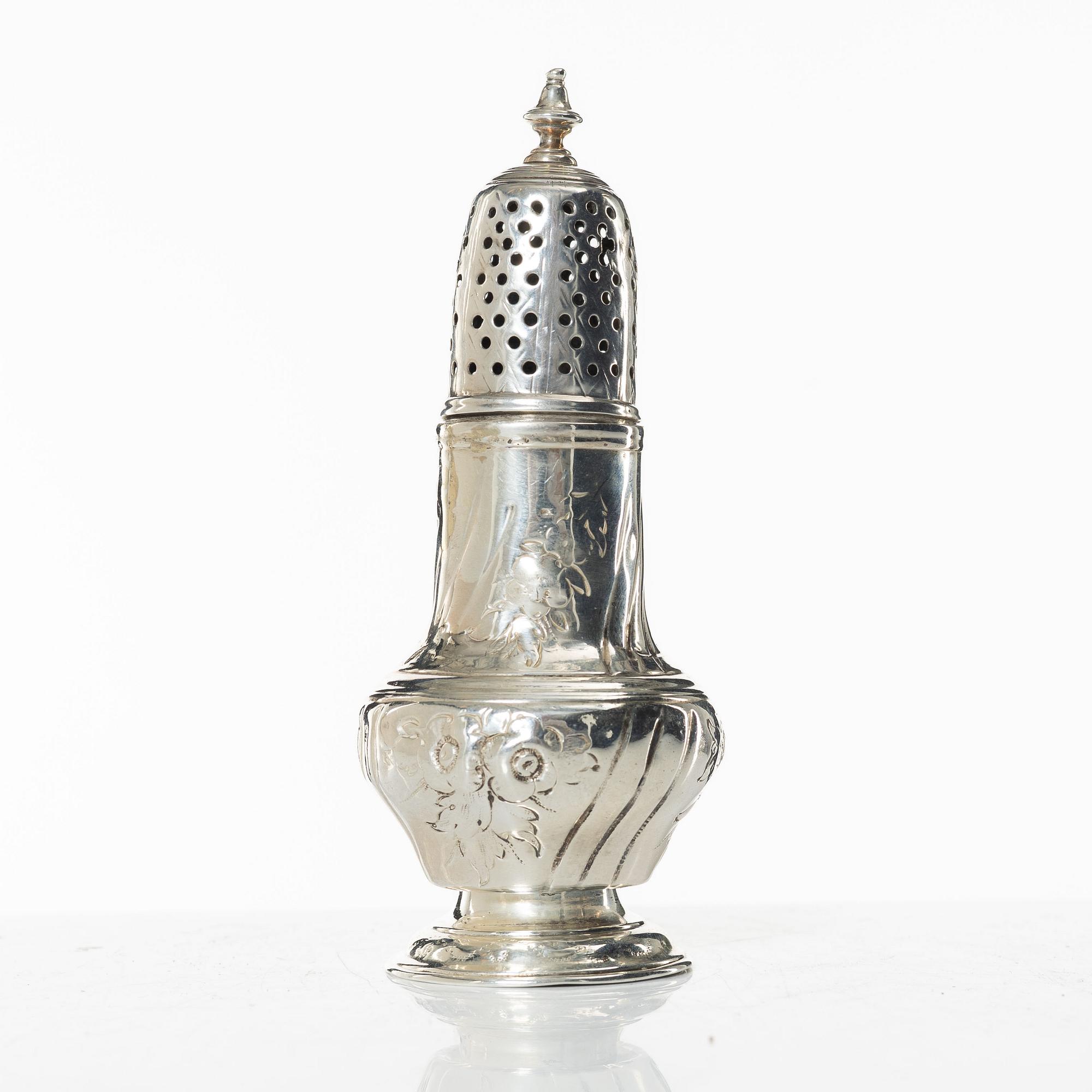 An English Rococo silver caster, mark of Samuel Smith III, London 1754.