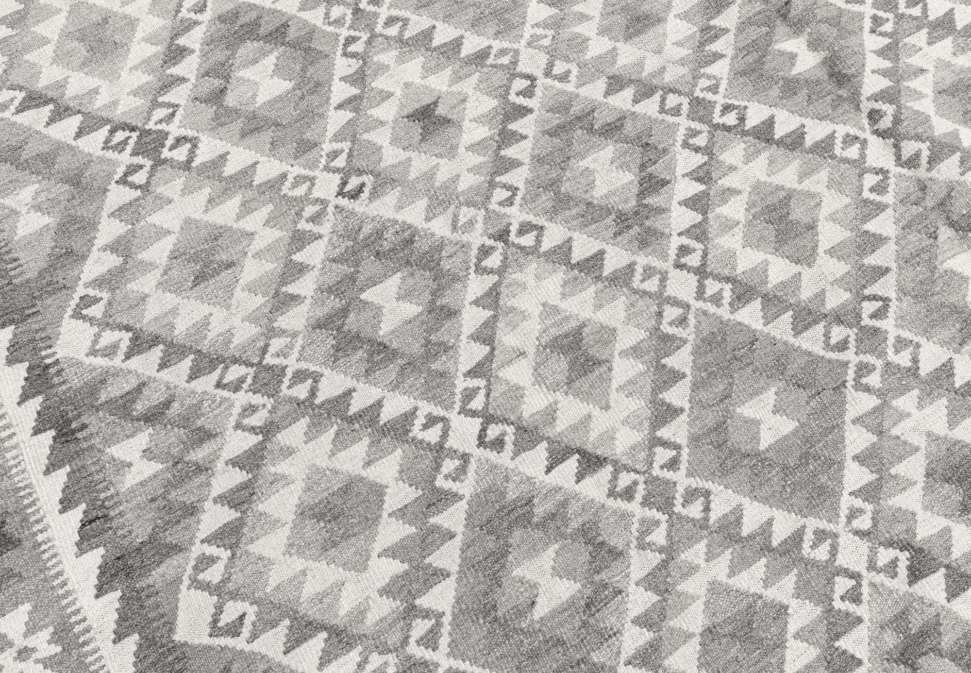 A carpet, kilim, ca 390 x 298 cm.