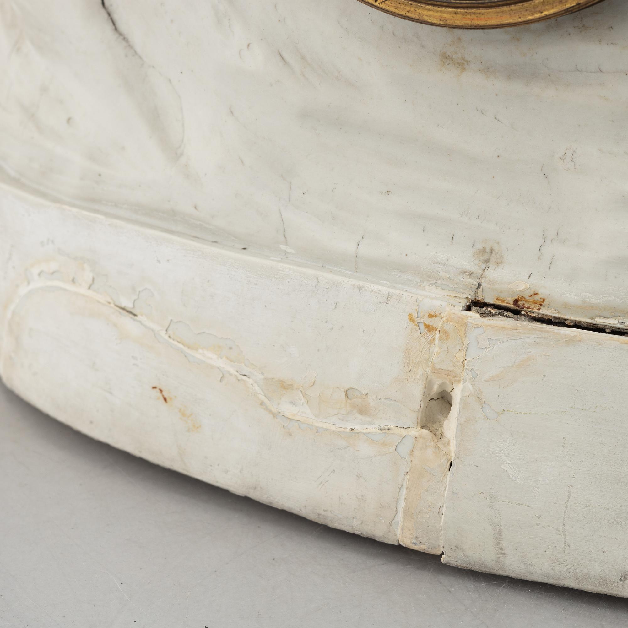 A French Louis XVI bisquit porcelain and ormolu-mounted figural mantel clock, late 18th century.