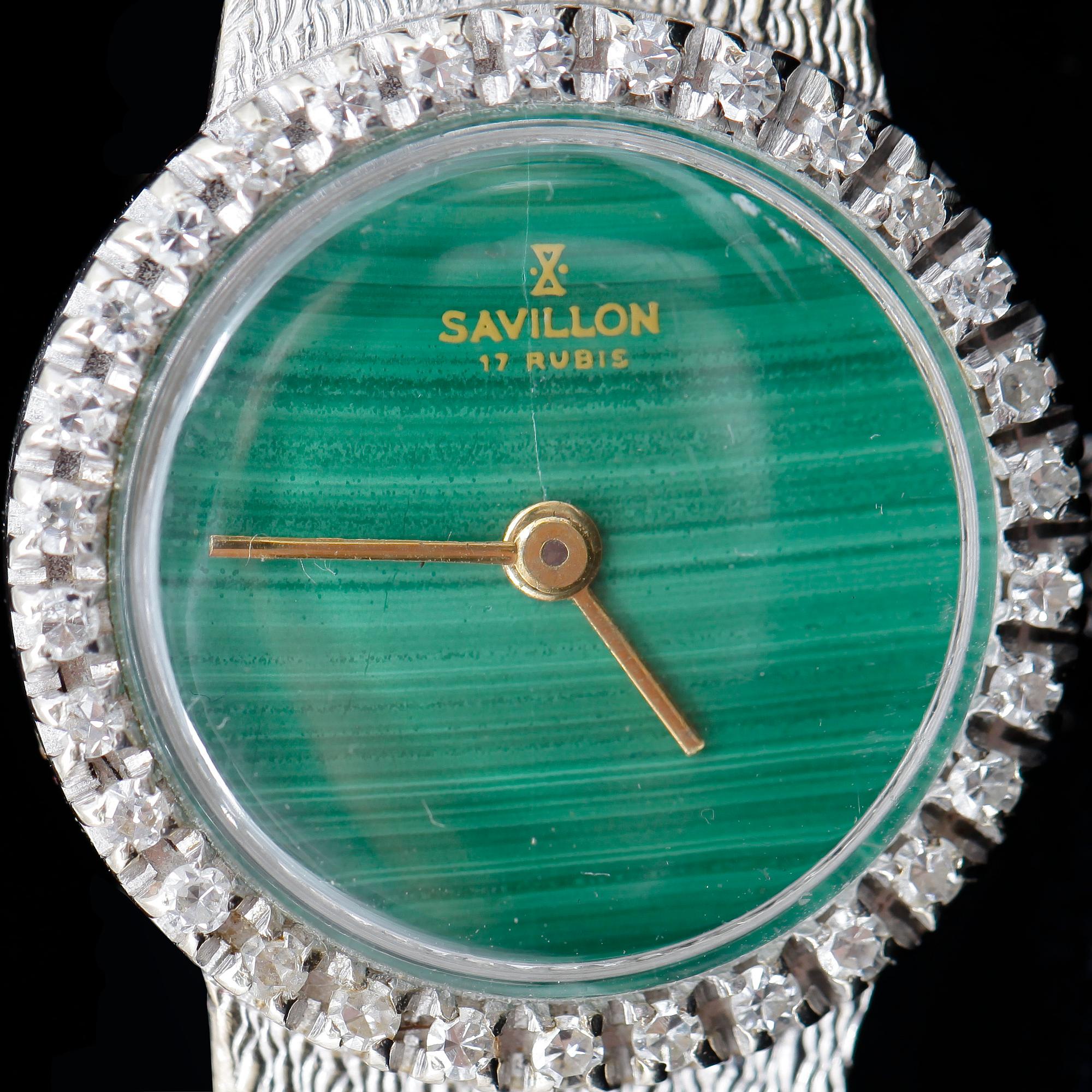 DAMARMBANDSUR, Savillon, 18k vitguld med briljantslipade diamanter, tot. ca 0.30 ct samt malakit. Tot ca 34 g.
