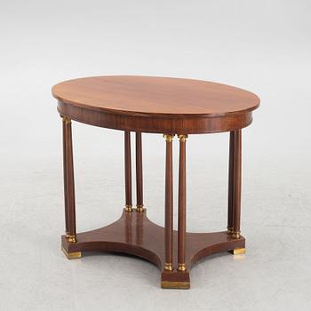 An Empire style table, early 20th Century.