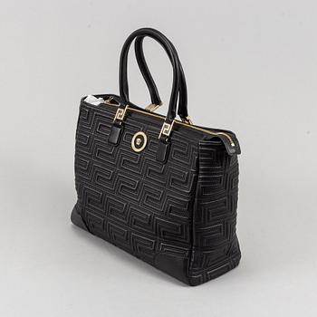Versace, a black quilted leather handbag.
