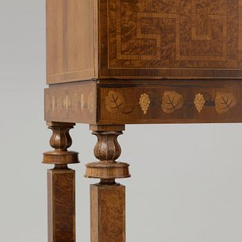 A Gösta Thorell cabinet on stand, Stockholm 1929, executed by Georg Ryman.