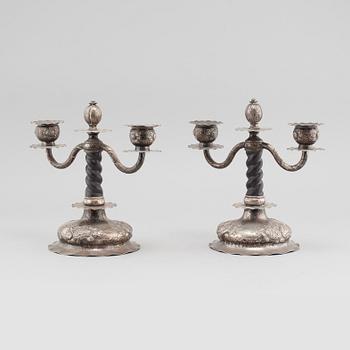 A PAIR OF SILVER CANDLEABRUMS, C G HALLBERG, 1937.