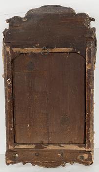 A second half of the 18th century rococo mirror sconce.