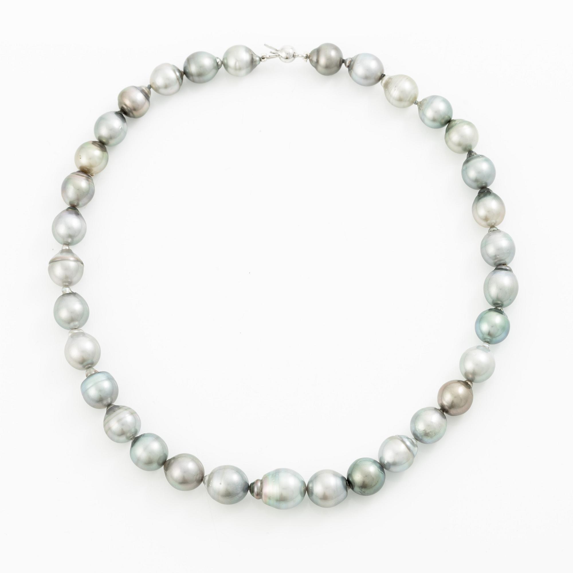Necklace with cultured baroque Tahitian pearls.