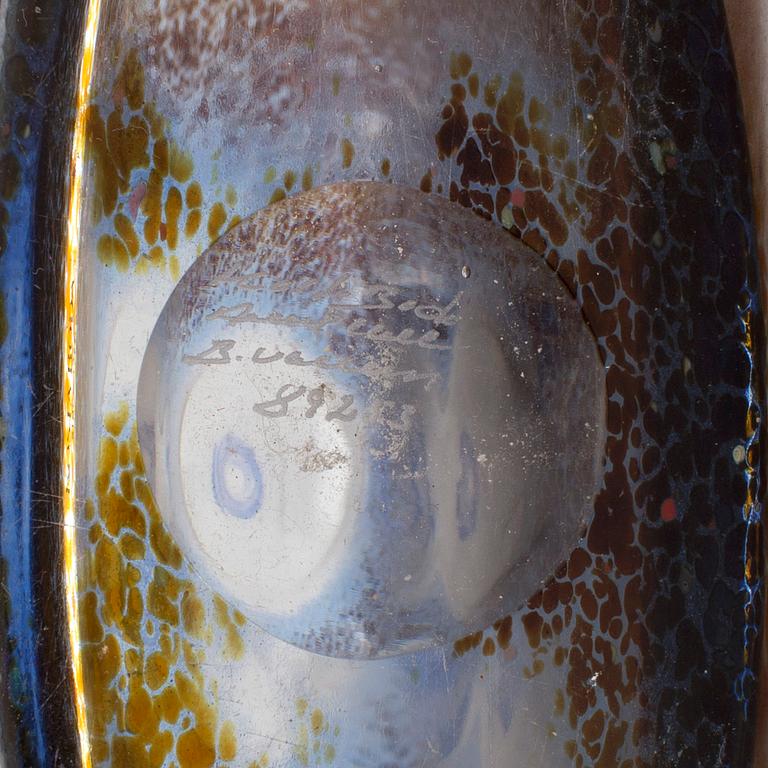 A glass flask by Bertil Vallien, Kosta Boda, signed and numbered 89253.