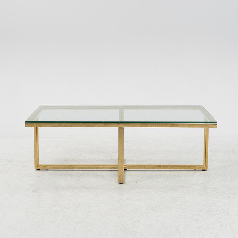 A 21st Century 5 pcs glass coffee table.