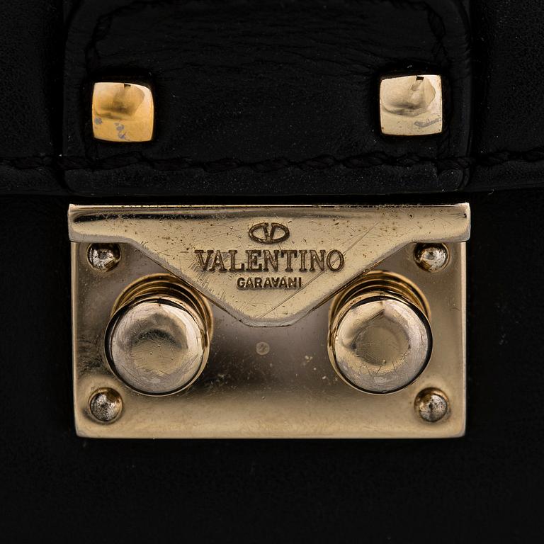 Valentino Garavani, a 'Glam Lock' bag.