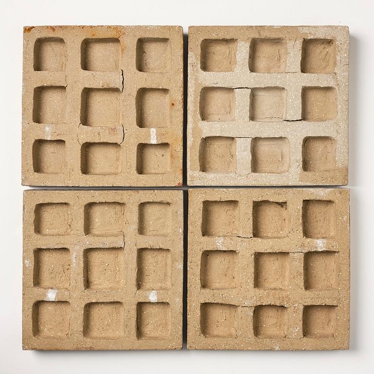 Stig Lindberg, a chamotte stoneware relief, four pieces, Gustavsberg Studio 1940s.