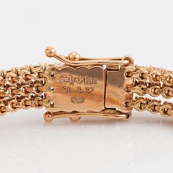 Brilliant cut diamond bracelet.