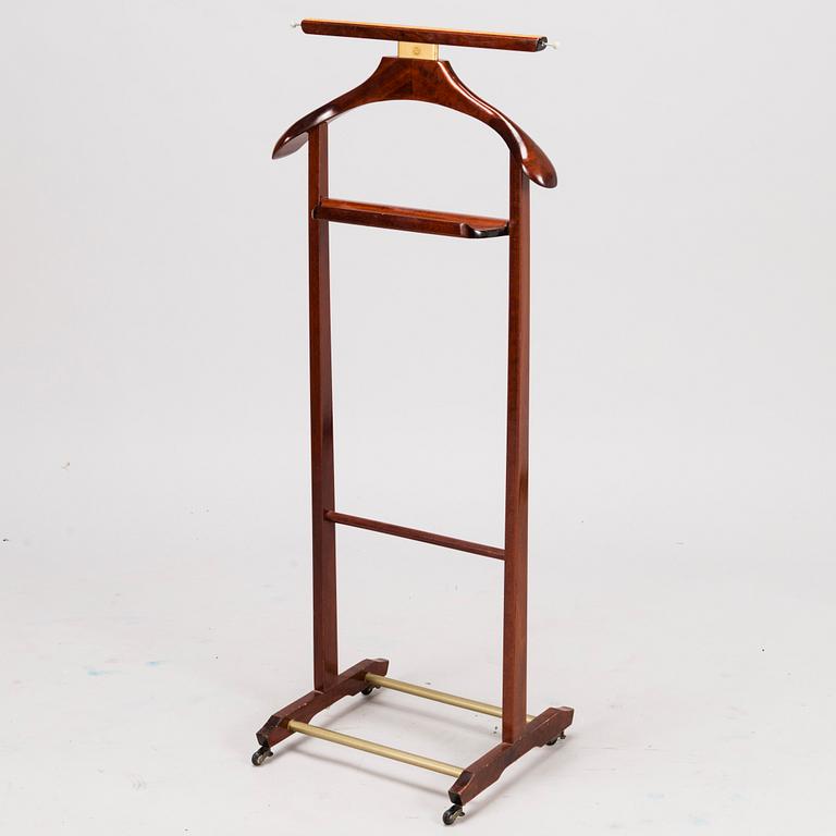 An Italian Fratelli Reguitti valet stand from the latter half of 20th century.