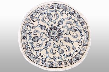 A rug, Nain, part silk, diameter ca 100 cm.