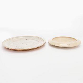 Kyllikki Salmenhaara, two stoneware plates signed KS and a book signed by Kyllikki Salmenhaara.