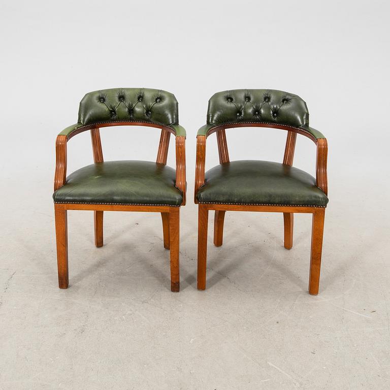 A pair of leather armchairs from the second half of the 20th century.