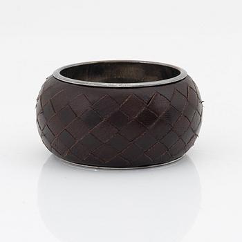 Bottega veneta, a leather and silver bangle.