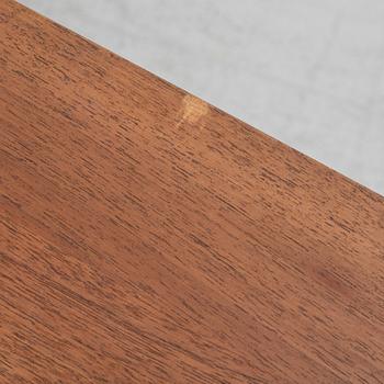 Dusty Deco, a contemporary walnut dining table.