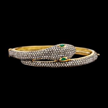 A rose cut diamond bangle, with eyes of tsavorites, tot. app. 4 cts.