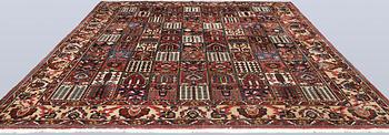 A semi-antique Baktiari carpet, approx. 360 x 308 cm.