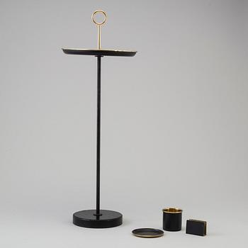 GUNNAR ANDER, a brass and iron table from Ystad-Metall, mid 20th Century.