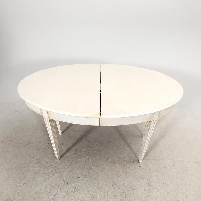 A painted 19th/20th Gustavian style dining table.
