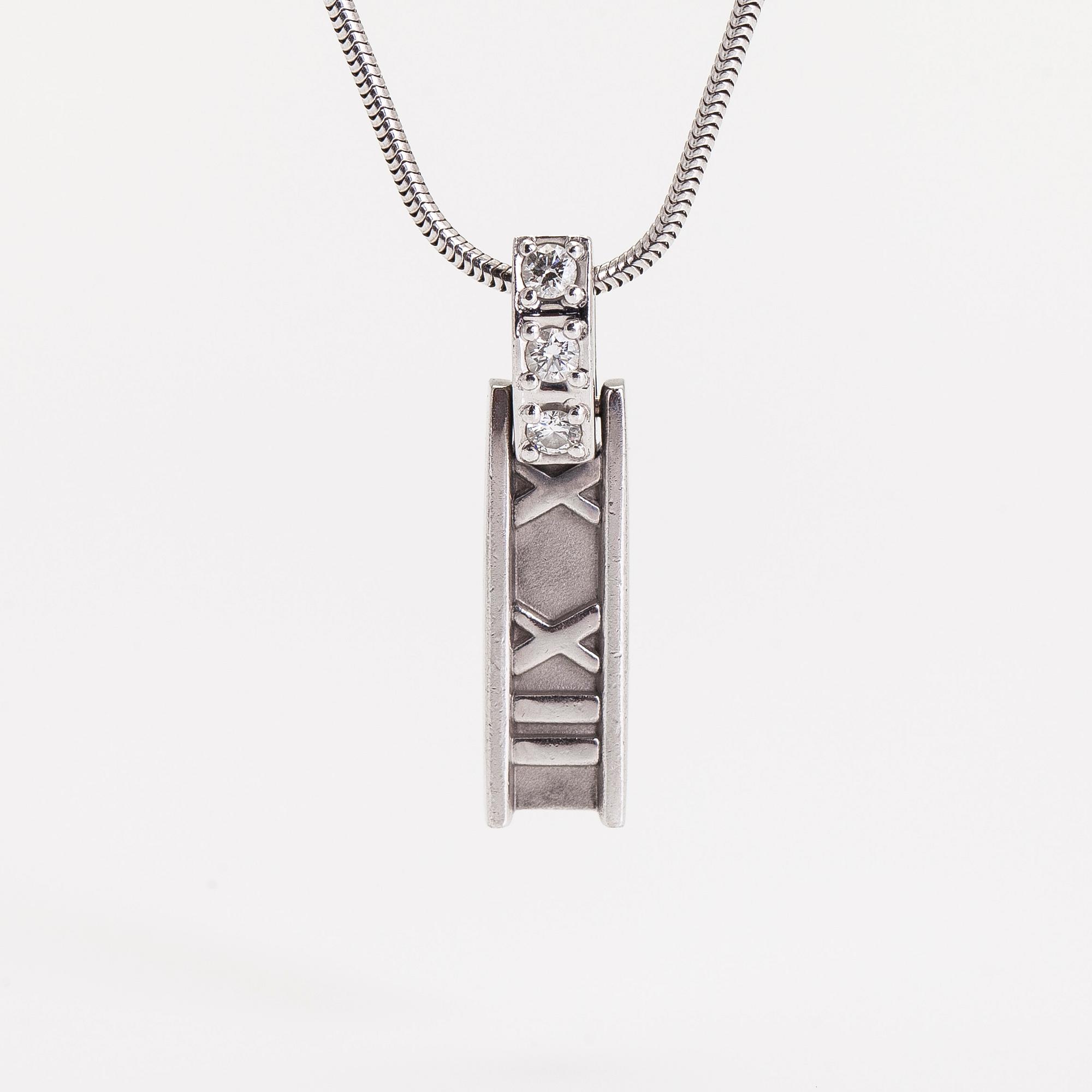 Tiffany & Co, a 18K white gold 'Atlas Bar' necklace with diamonds ca 0.06 ct.