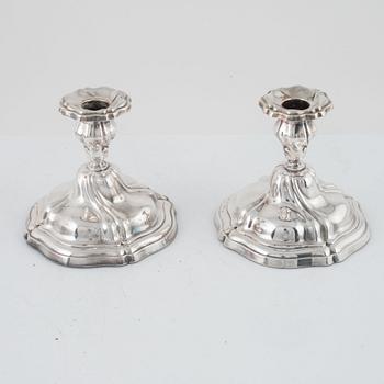 A pair of Norwegian silver candlesticks, mark of Magnus Aase, Bergen, 20th century, Swedish import marks.
