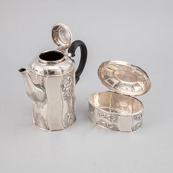 A silver coffee pot, creamer and sugar box. Swedish import mark.