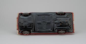 A Japanese Nomura Toys Ford Mustang, 1960s.