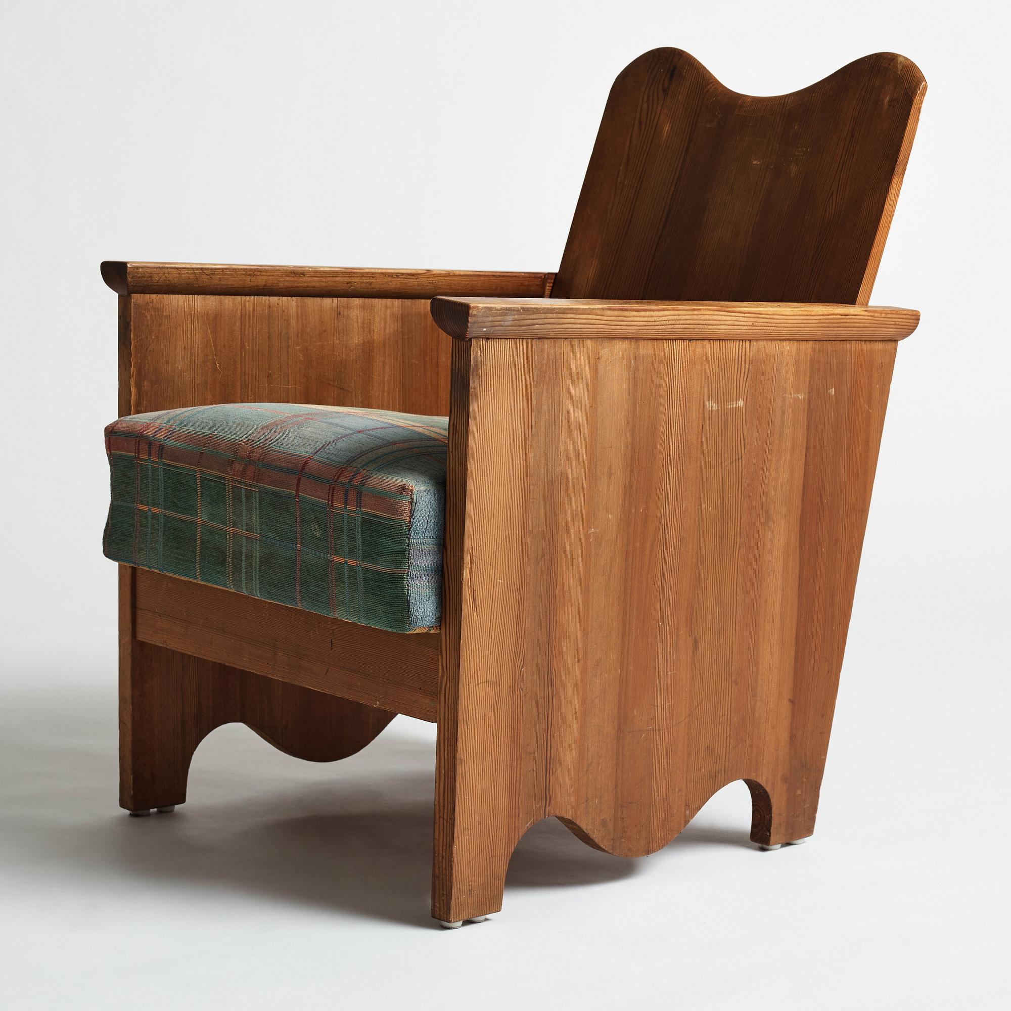 Axel Einar Hjorth, a stained pine easy chair "Utö", Nordiska Kompaniet, Sweden 1930's.
