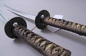 TRÄNINGSSVÄRD, 2 st, Japan, Katana resp wakisashi, 1900-tal.