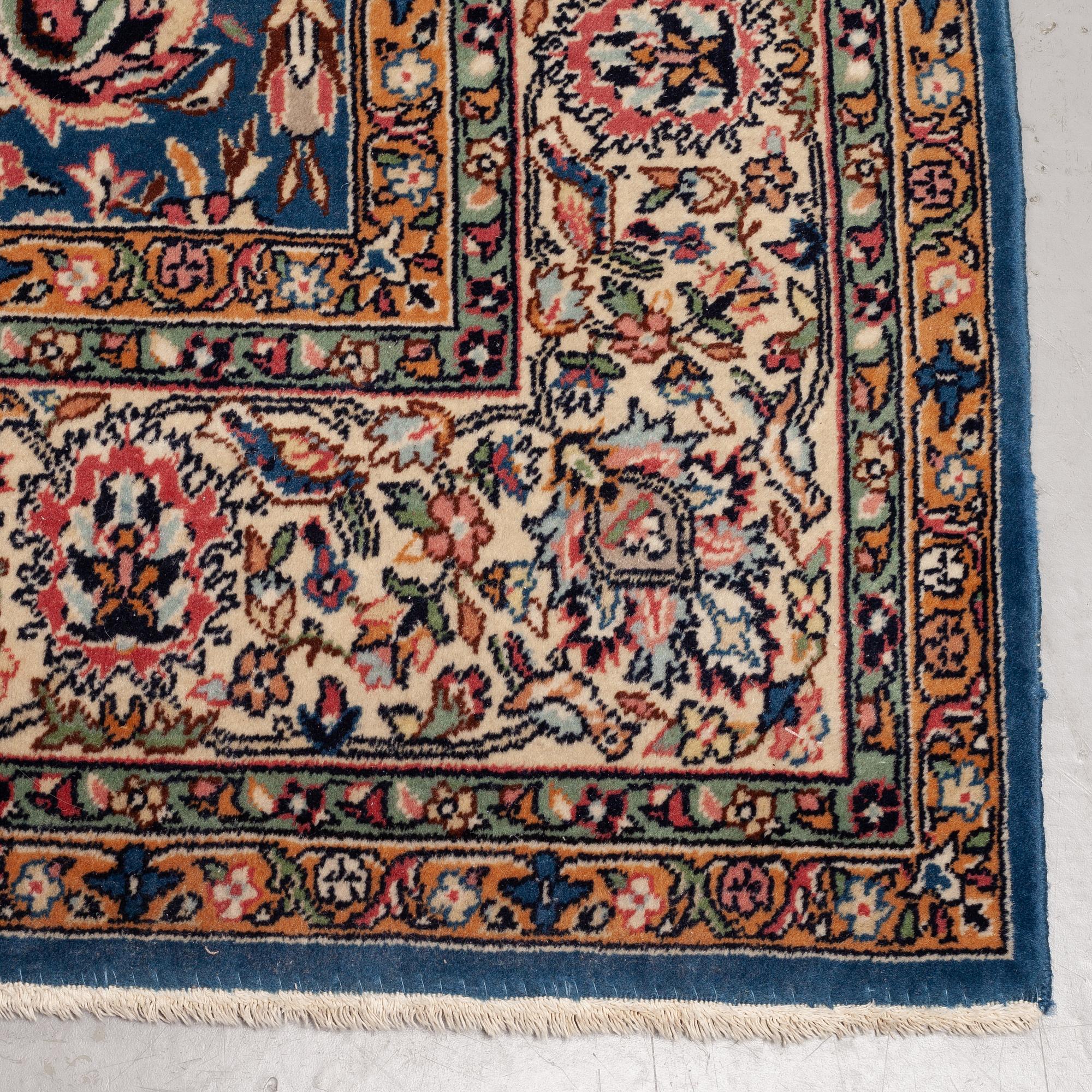 A carpet semi-antique/old oriental, ca 346 x 246 cm.