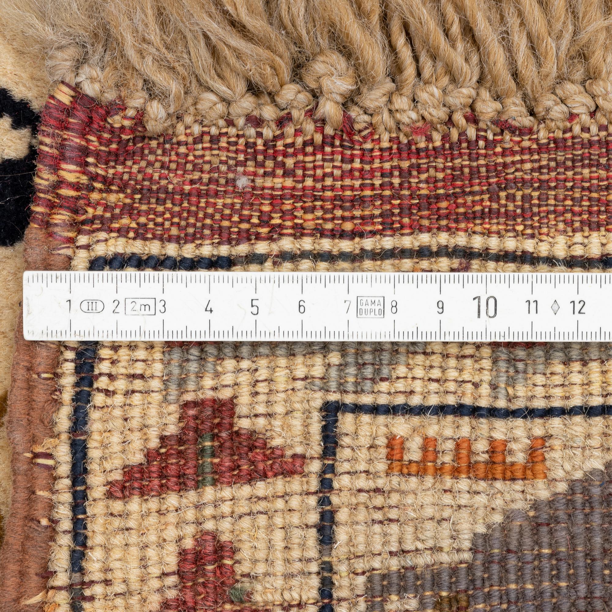 Carpet, oriental, known as War Rug, 1980s-90s. C. 154 x 95 cm.