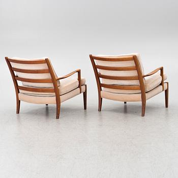 Arne Norell, a pair of 'Löven' armchairs, Norell Möbler.