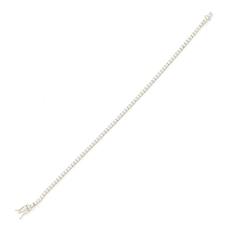 Tennisamband, 18K vitguld med briljantslipade diamanter.