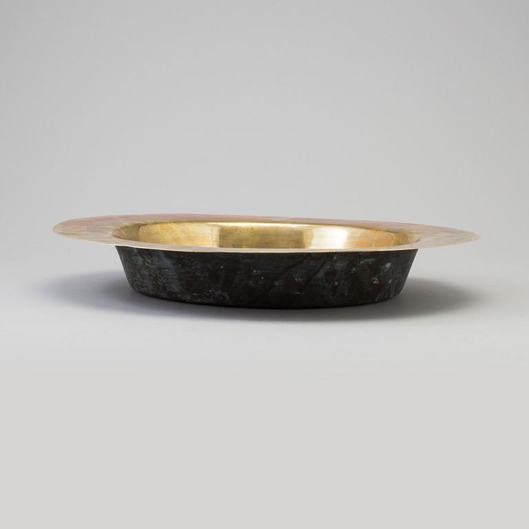 A brass dish, 16th century, Nürnberg.