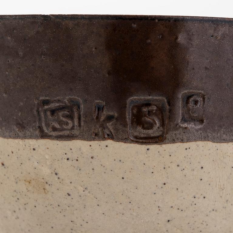 Kyllikki Salmenhaara, a stoneware tea strainer signed KS.