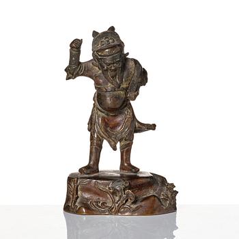 A bronze sculpture of a man with a tablet, Ming dynasty (1368-1644).