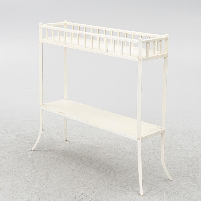 A plant stand, circa 1900.