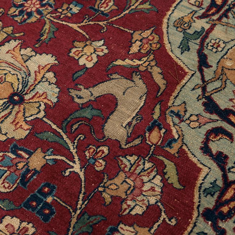 A CARPET, A semi-antique Esfahan part silk, ca 350,5 x 233,5 cm.