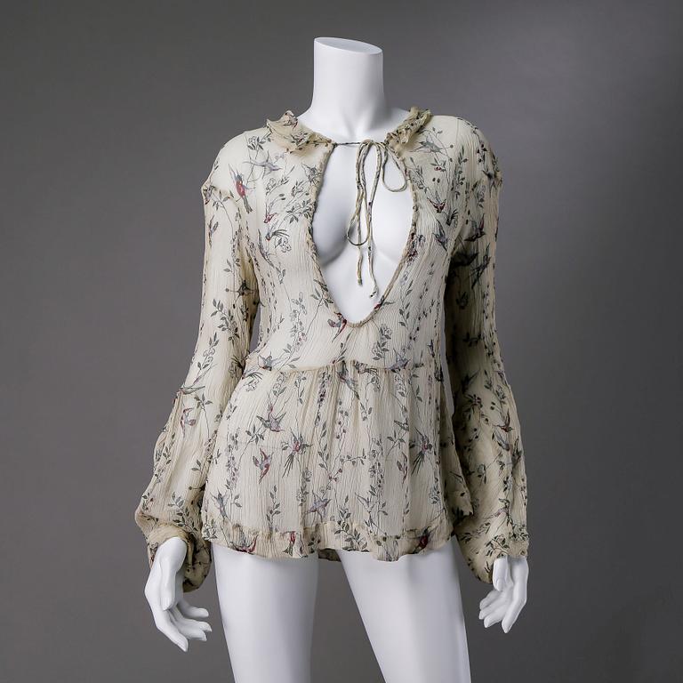 BLUS, Marni.