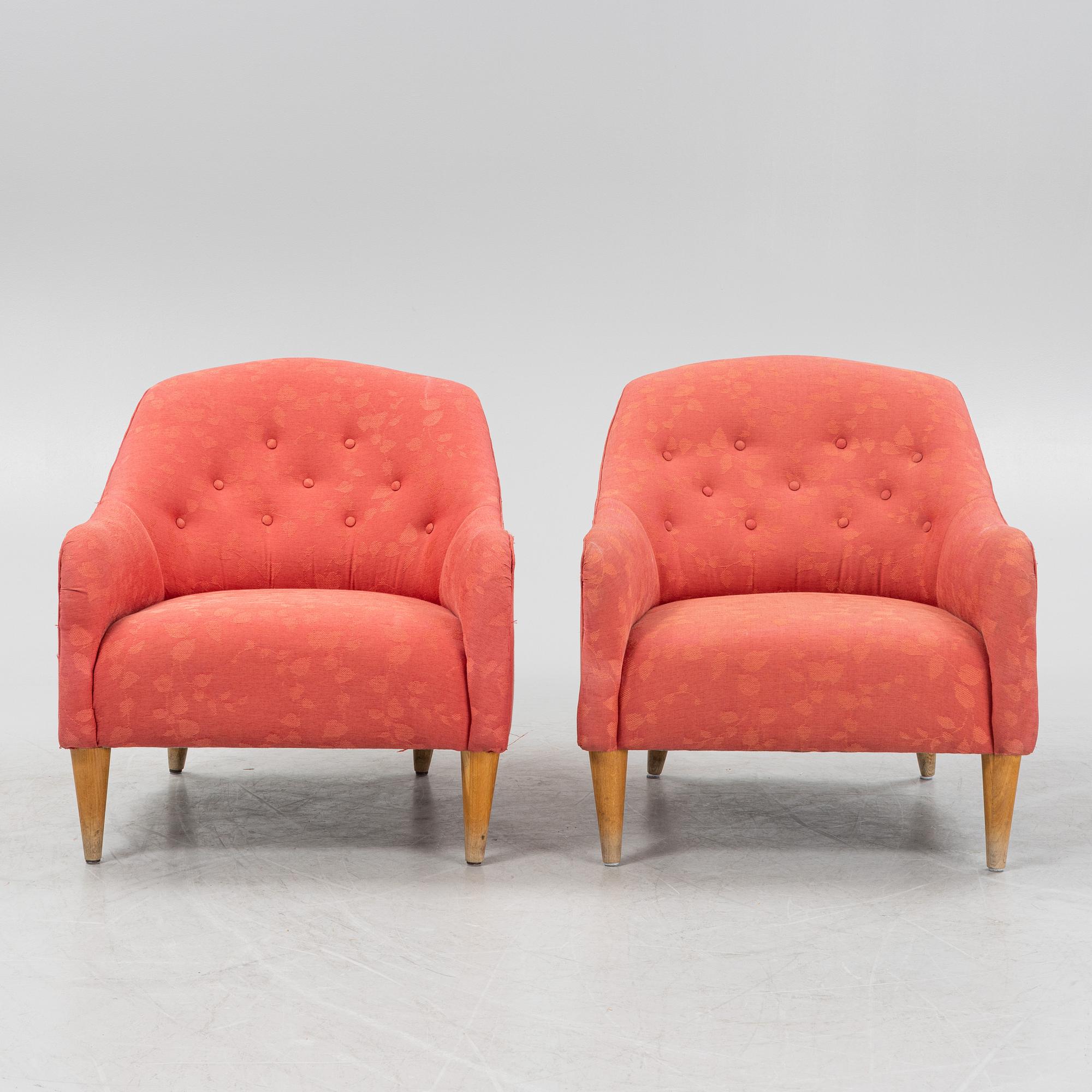 A pair of armchairs, later part of the 20th Century.