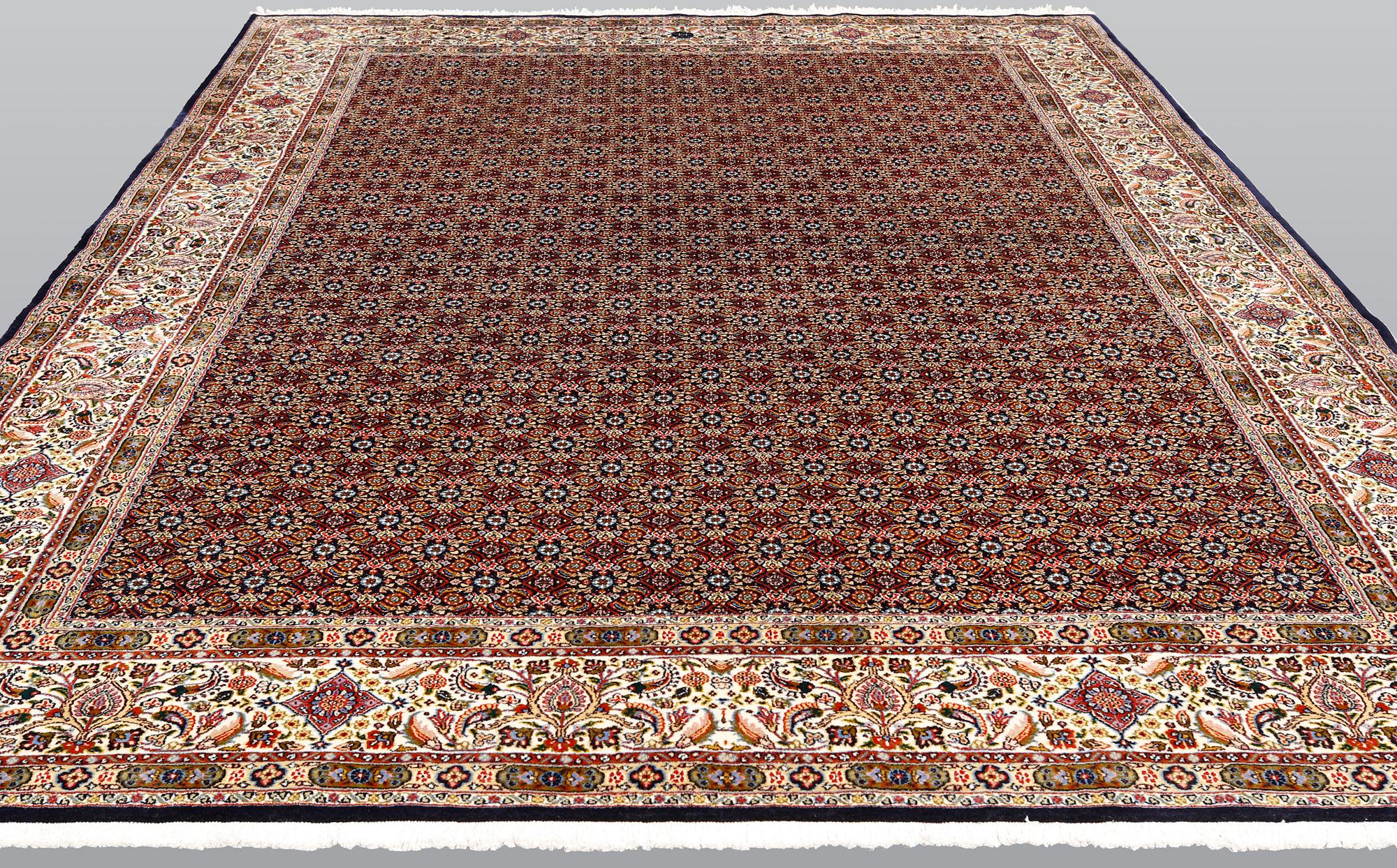 A Moud part silk carpet, signed, 335 x 250 cm.