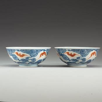 A pair of blue and white 'bats' bowls, China, 20th century, with Guangxu six character mark.