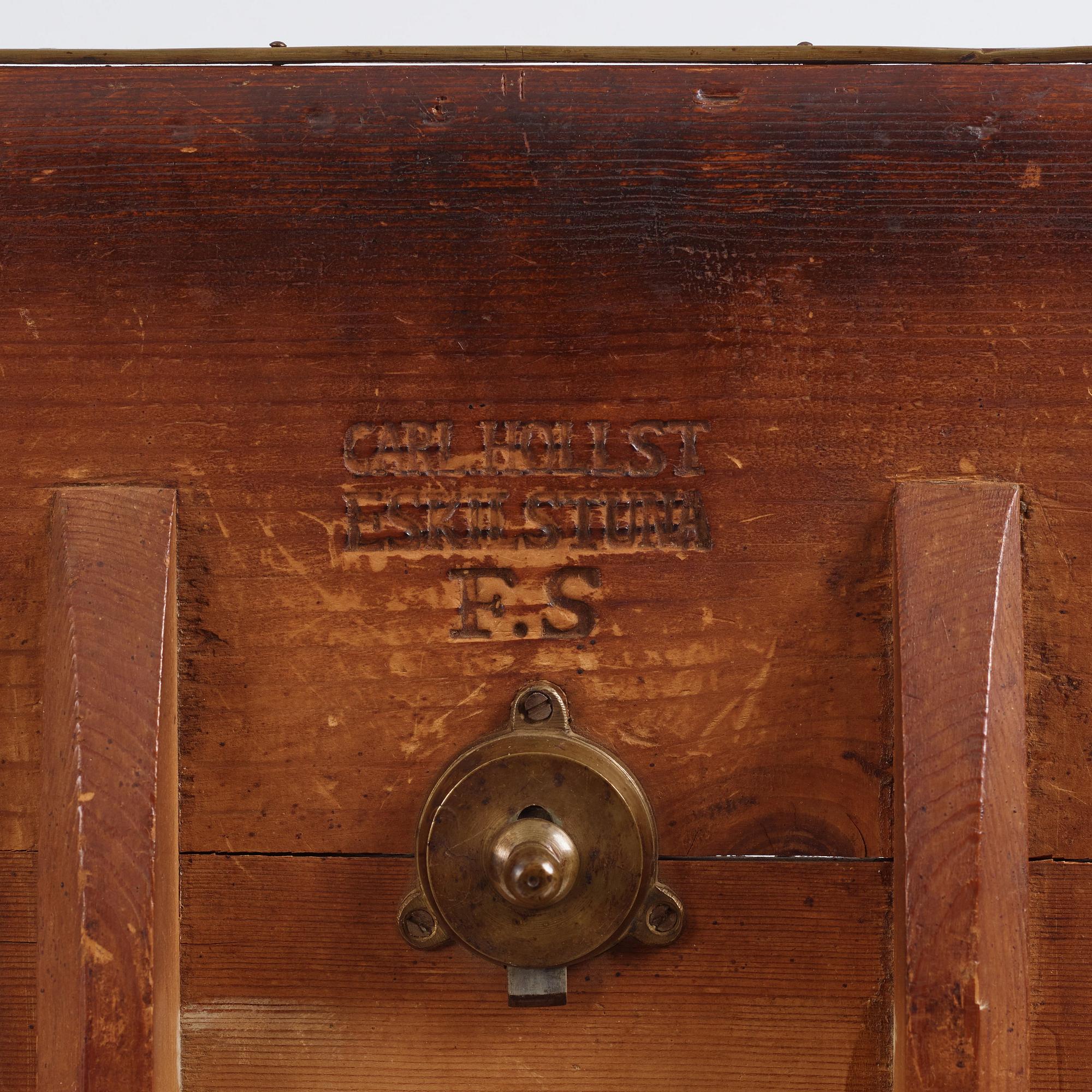 A pair of alder-veneered tilt-top tables by C. Hollst (master 1787-1830).