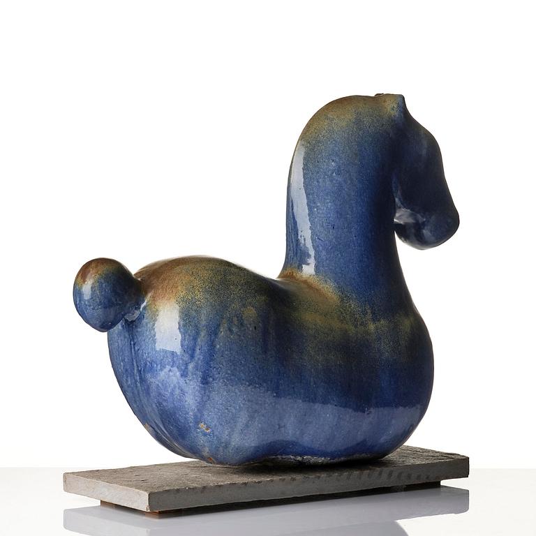 Ulla & Gustav Kraitz, a stoneware sculpture of a reclining horse, own studio, Förslöv.