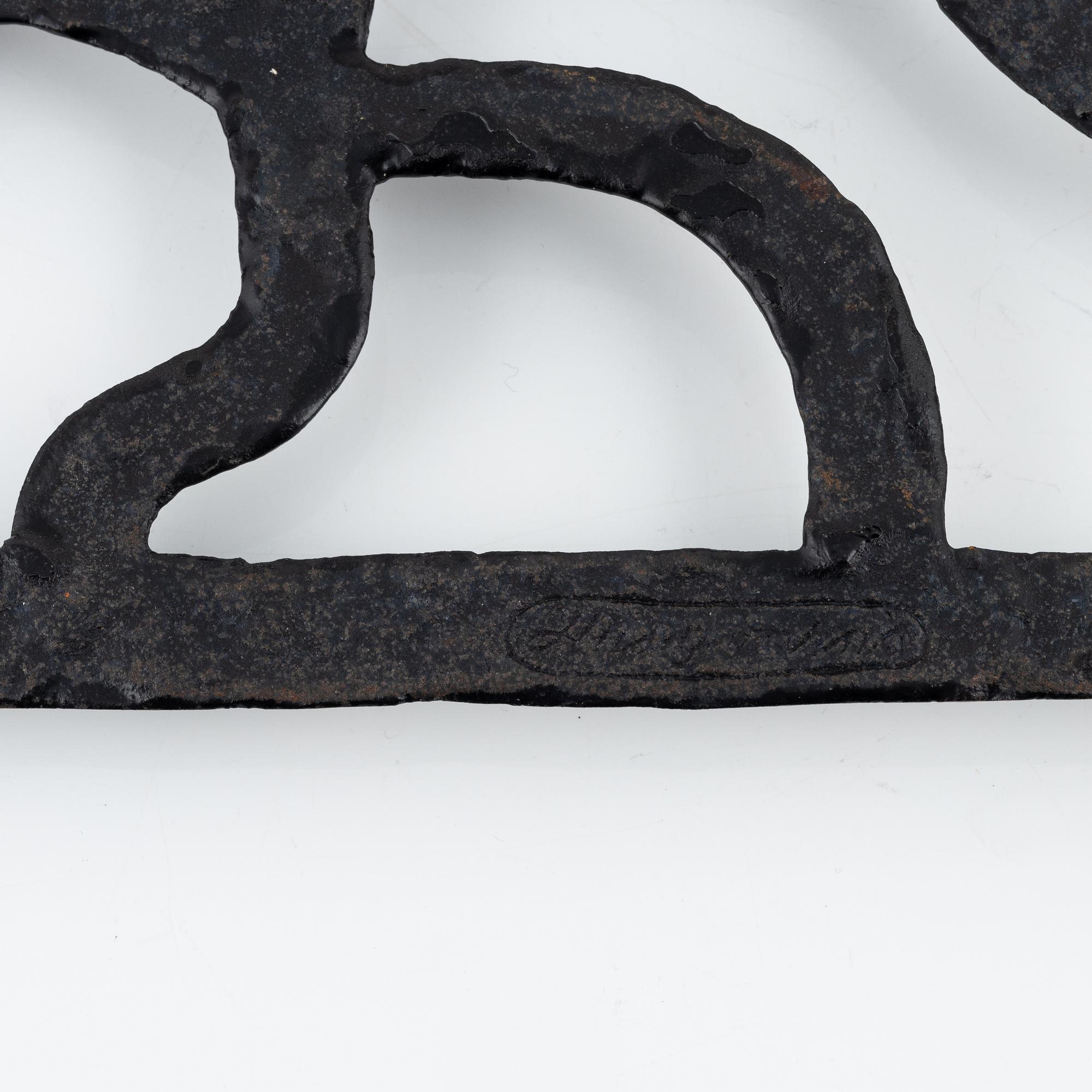 Olle Hermansson, a cast iron fire screen, Husqvarna.